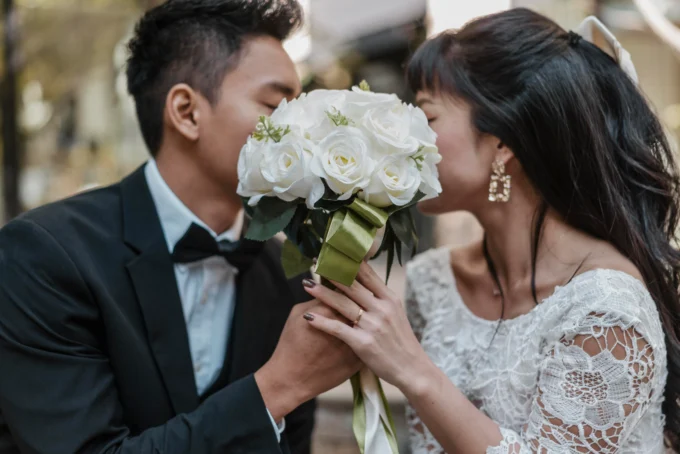 bride and groom posing for wedding pictures