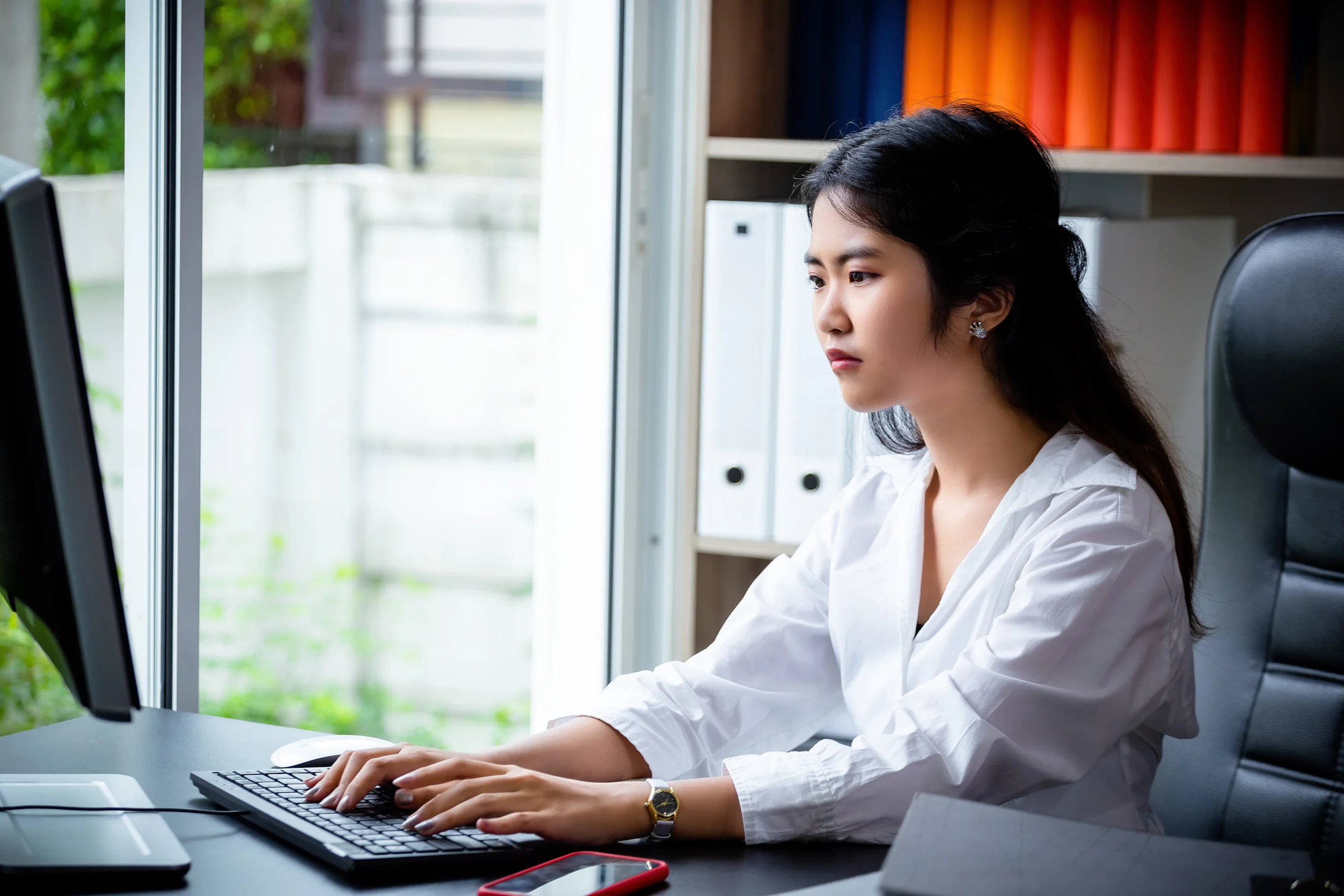 Young women are working on her tasks
