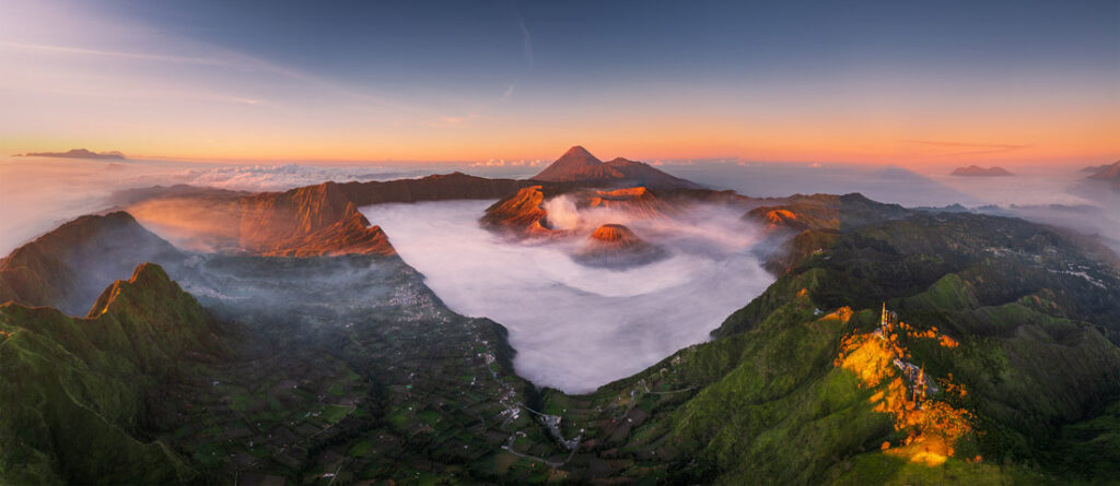 Mount Bromo volcano rising above a sea of cloud in East Java, Indonesia