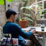 FedEx Import Tool customer reviewing import shipment on a tablet