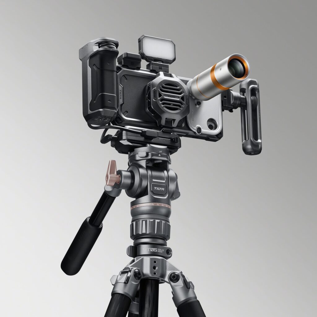 Tilta Khronos Creator Kit with handle, light and cooling fan mounted on a tripod